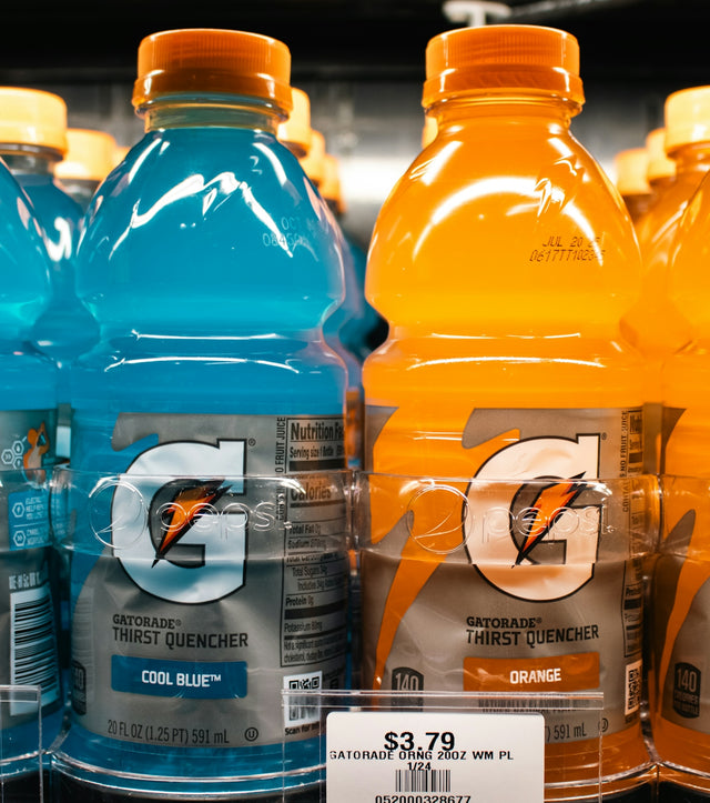 Gatorade bottles are displayed on a store shelf.