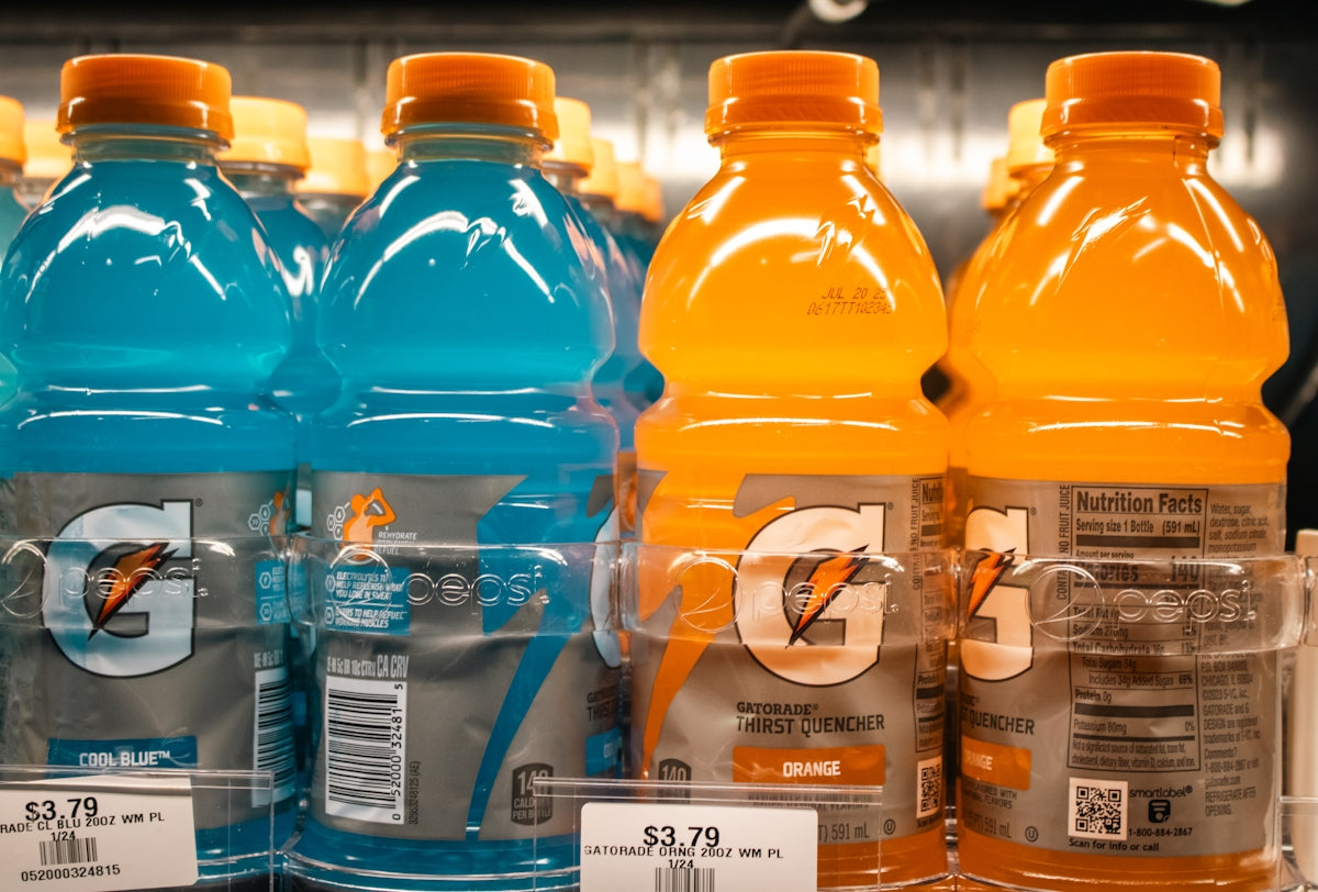 Gatorade bottles are shown on a shelf.