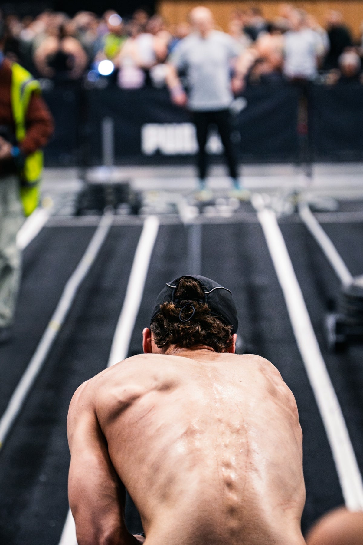 Athlete with a bun preparing for a competition.